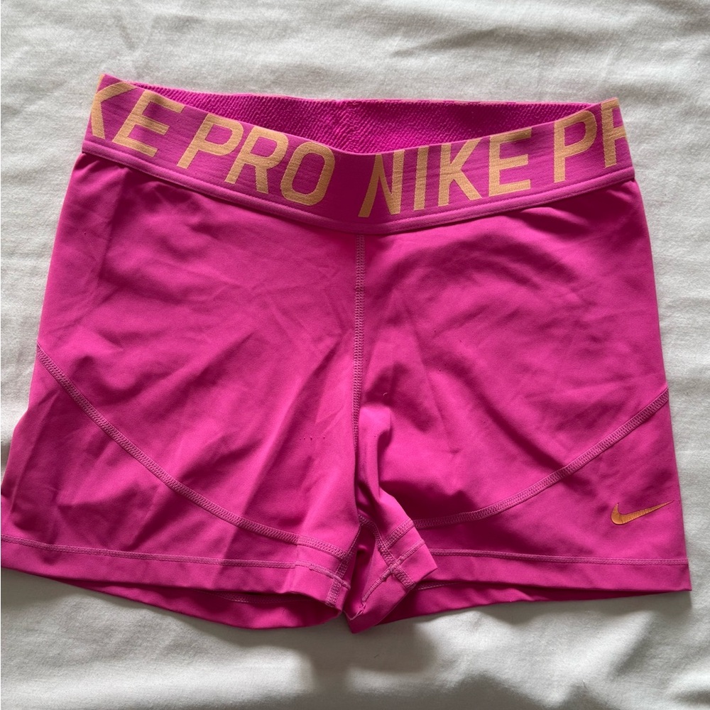 Nike Women's Athletic Shorts in Pink and Gold